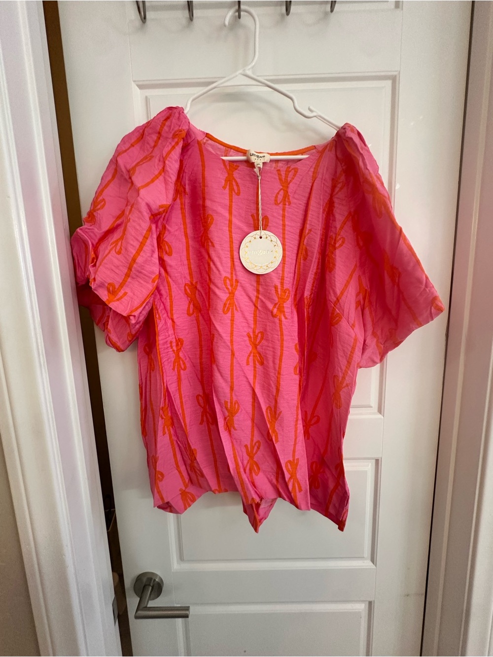 Umgee Hot Pink Short Sleeve Blouse with Orange Bow Print